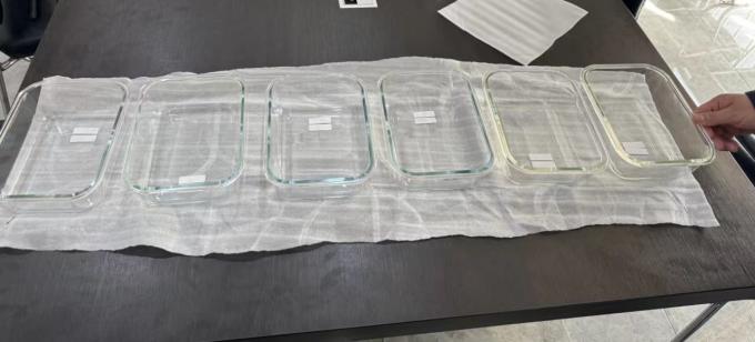 latest company news about Why some glass with blue color,some with yellow or green color？Is there any difference on the features?  0